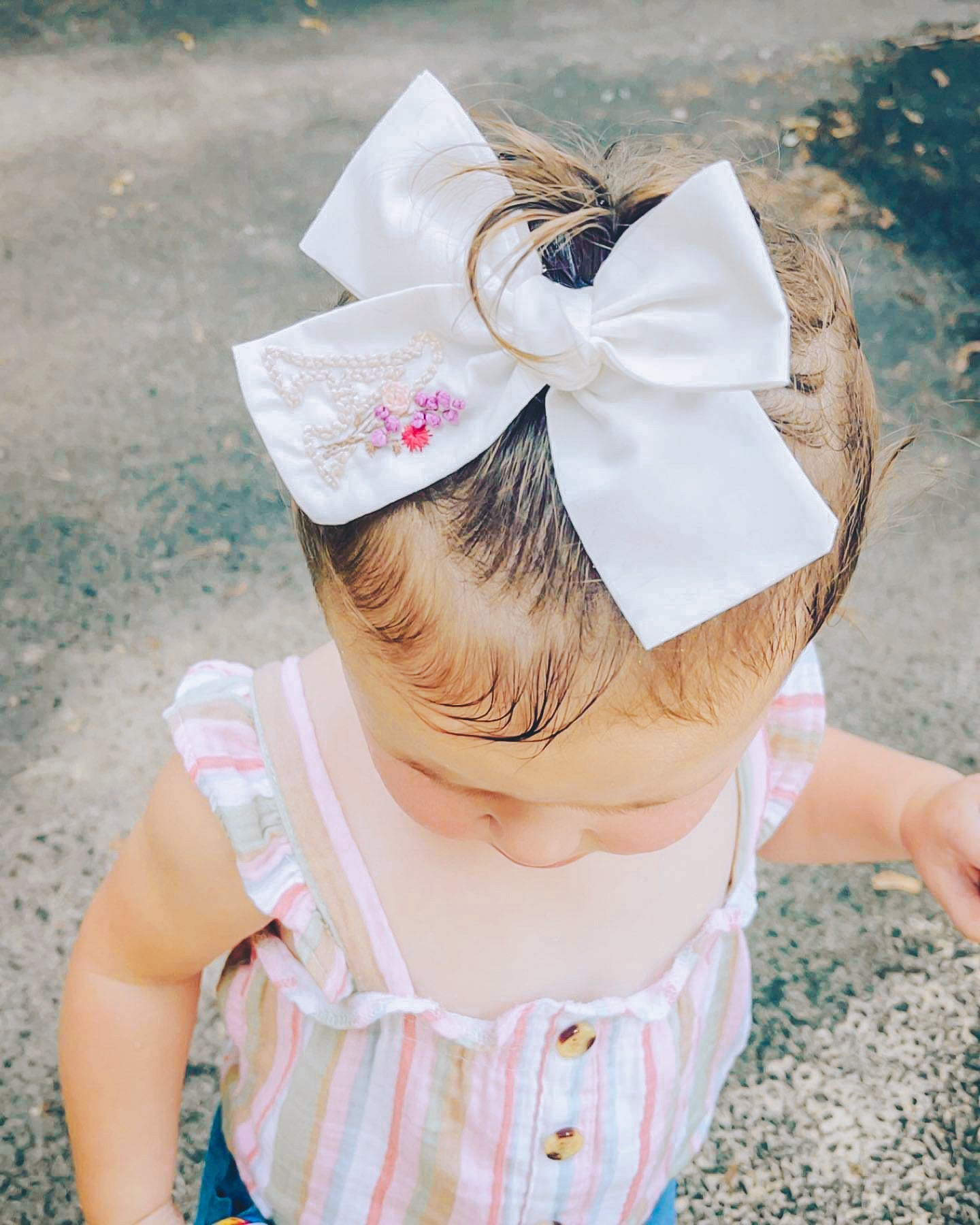 Hand embroidered initial bow with flowers