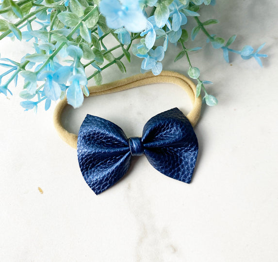 Navy shimmer newborn bow