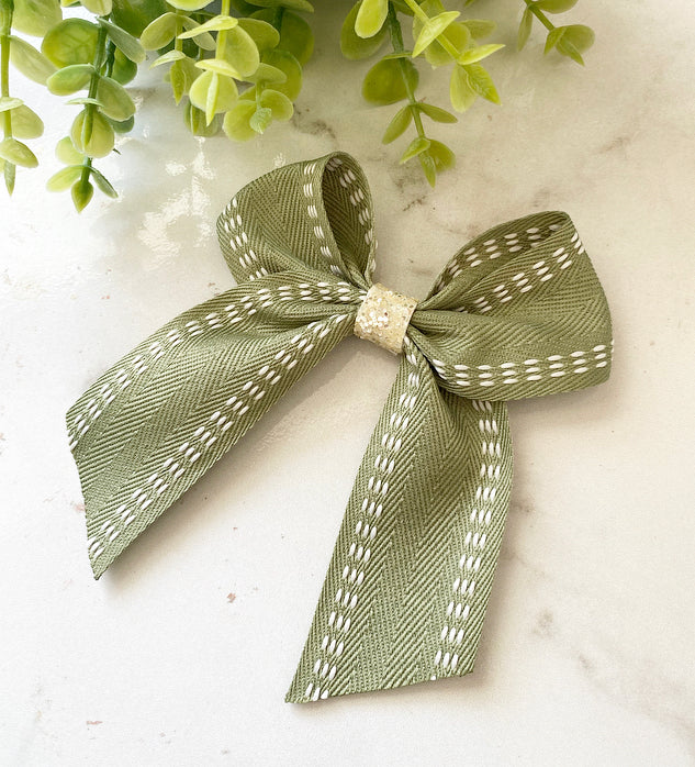 Cream trim, sage ribbon bow