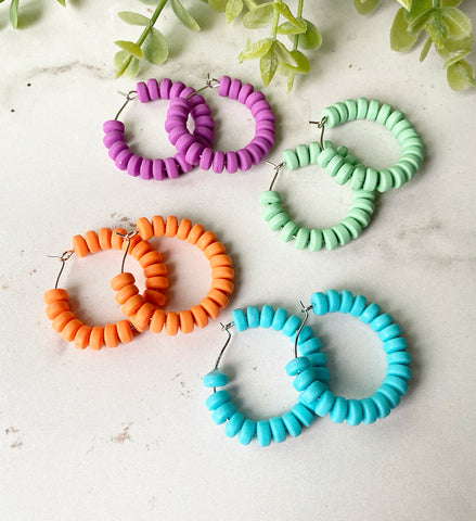 Bright colored clay hoops