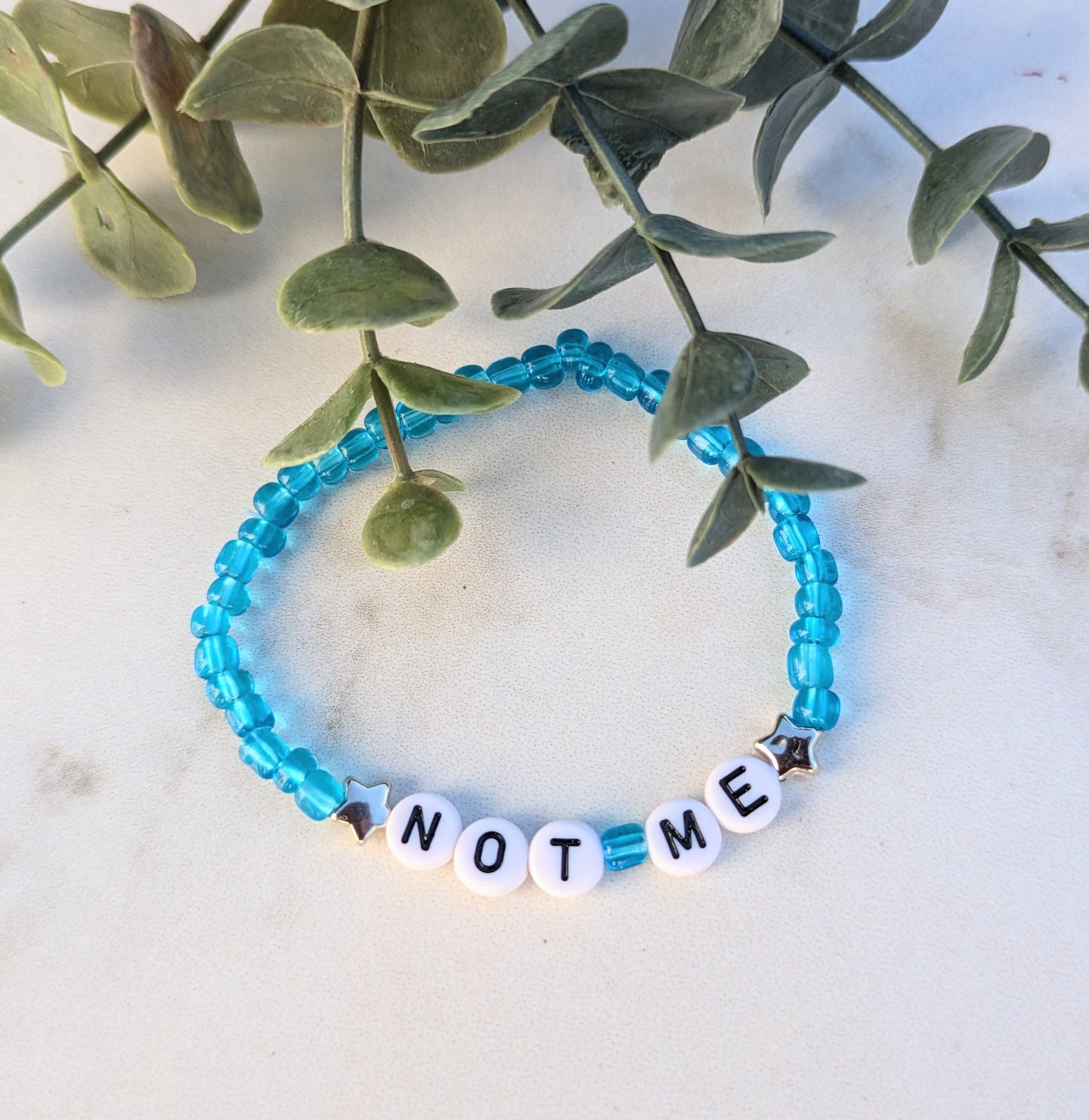 Not me!  blue movement bracelet