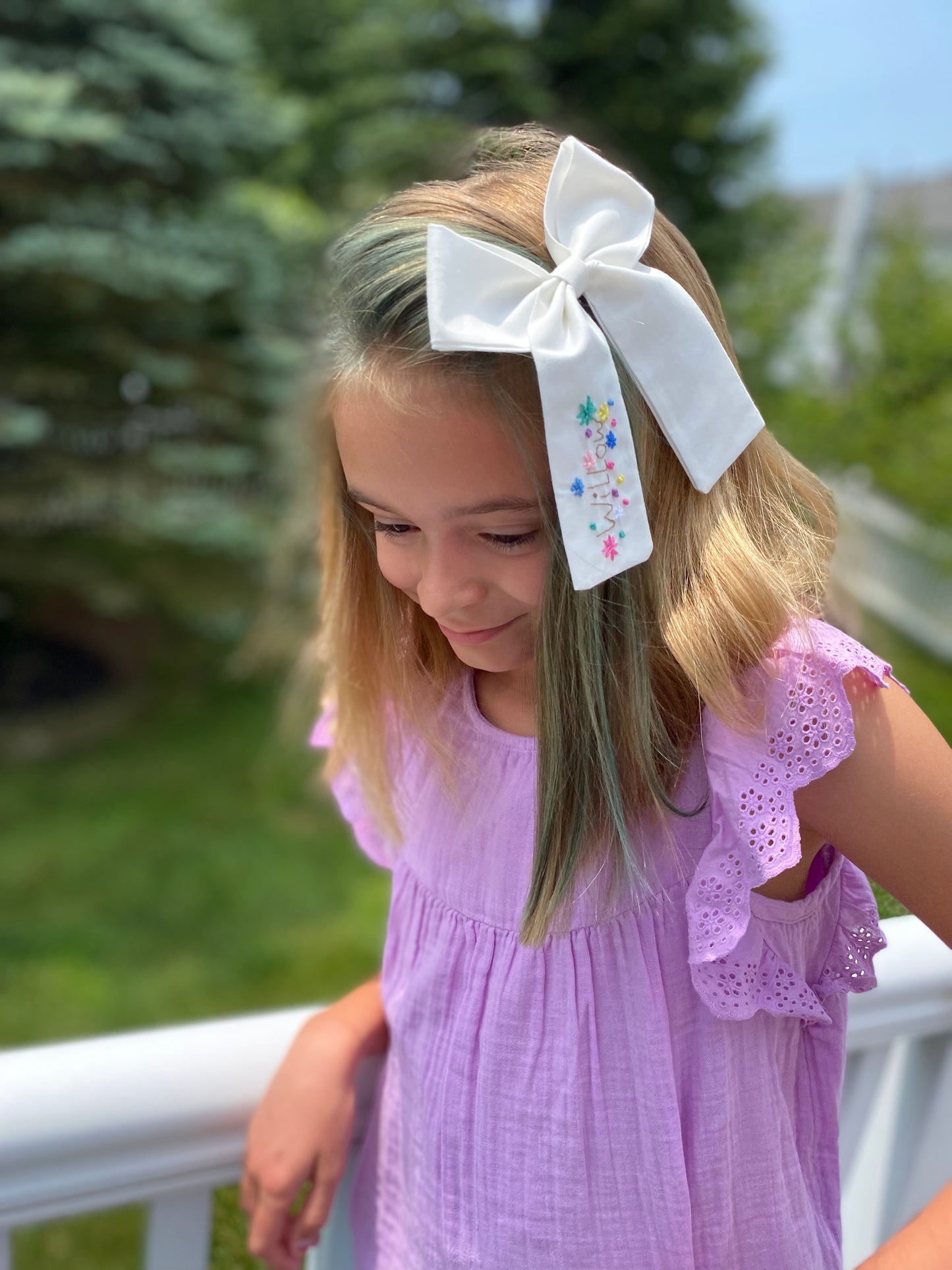 Embroidered name bow