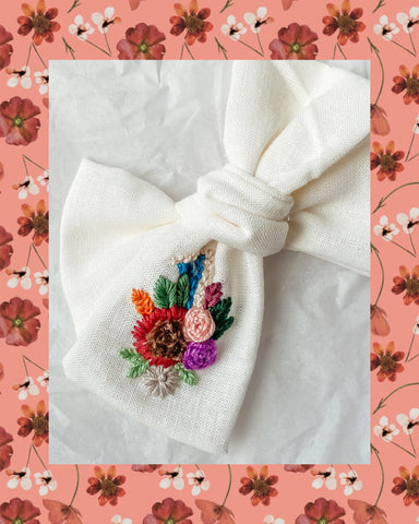 Hand embroidered floral bow