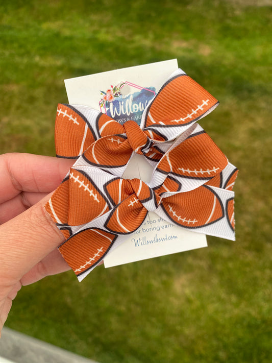 Football ribbon piggies