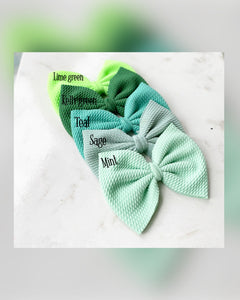Shades of green oversized bows