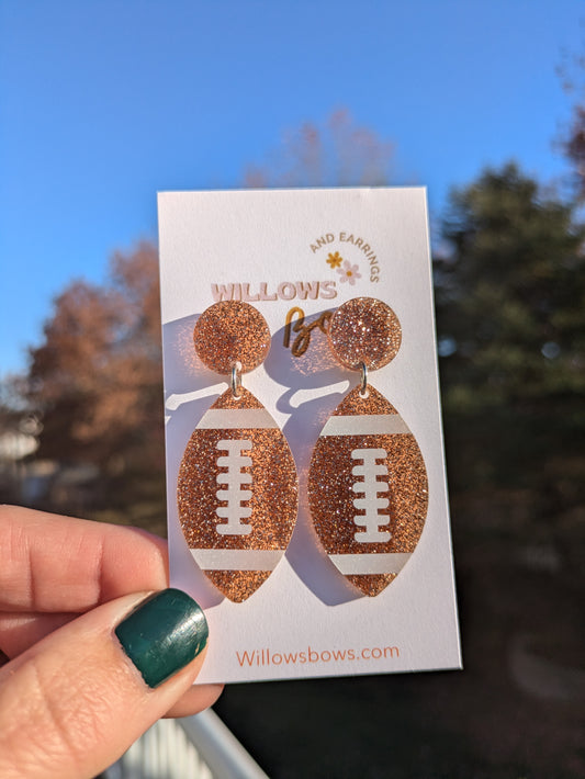 Glitter football, acrylic earrings
