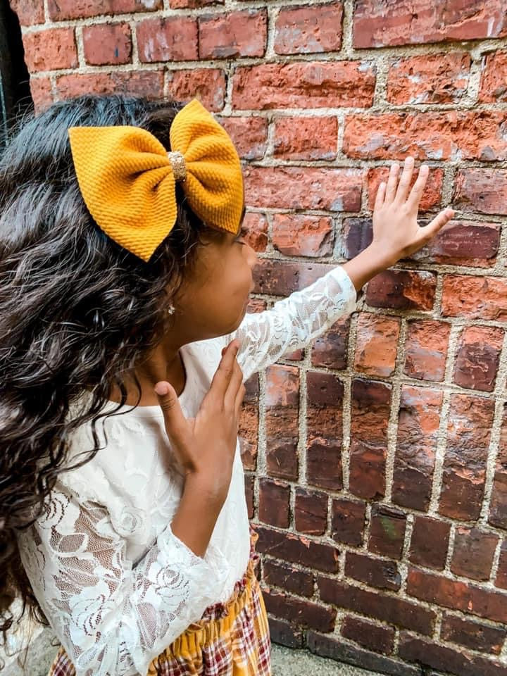 Mustard, oversized bows